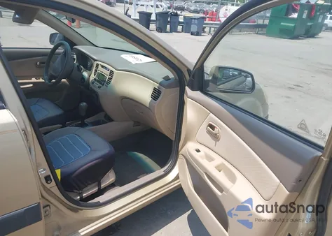 2009 Kia Rio Lx from USA, damaged, VIN KNADE223296477011